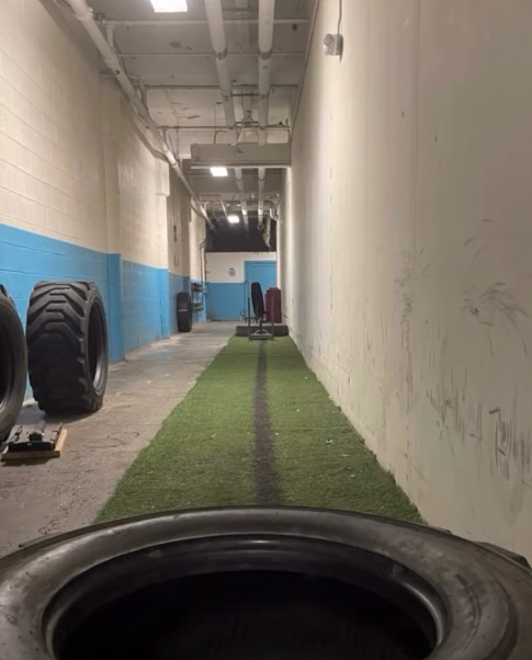 Turf and tire photograph in ruffier fitness personal trainer akron new hallway